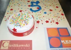 Tort firmowy Ken Center