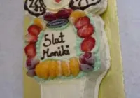 Tort w kształcie lalki