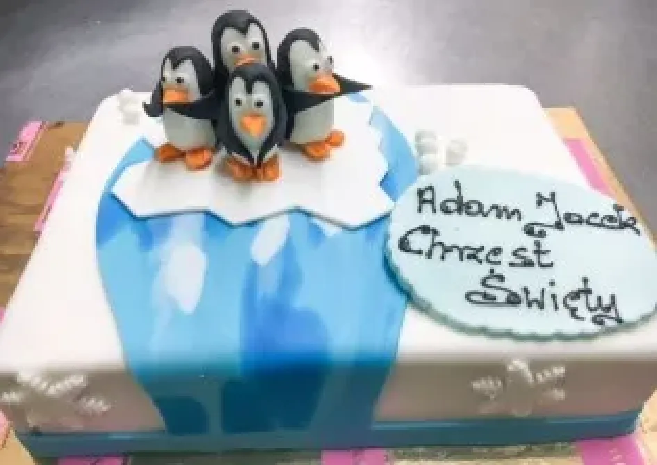 Tort na chrzest z pingwinami