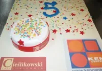 Tort firmowy Ken Center