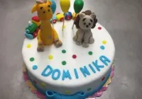 Tort z żyrafą i lwem